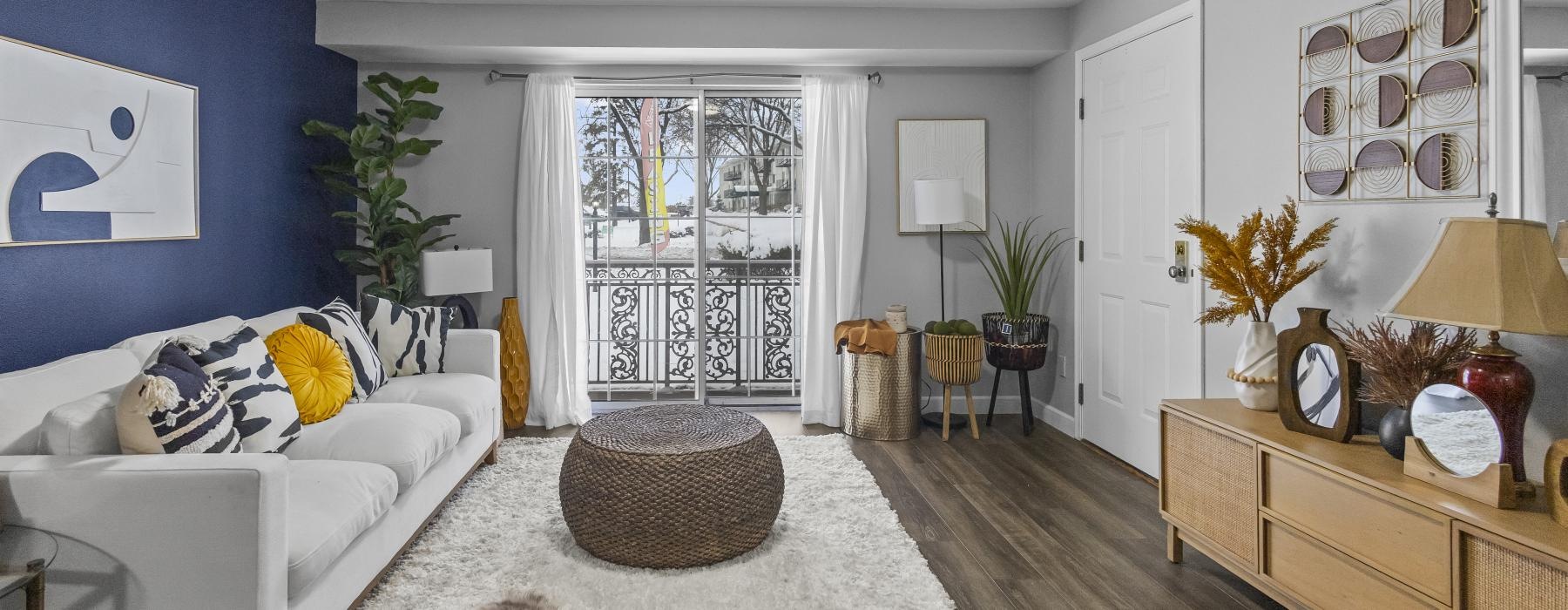 a living room with a couch and a table