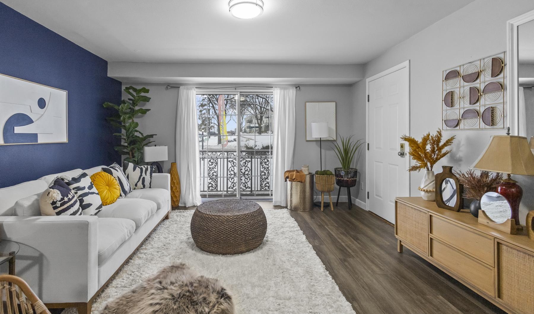 a living room with a couch and a table